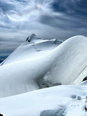 Fumaroles emitted from the Sherman Crater, with Sherman Peak in the background, on the way to the summit of Mount Baker. 07/02/2022