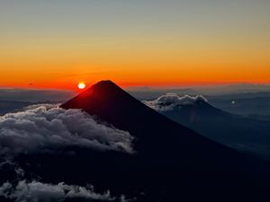 Sunrise behind Volcan de Agua, just outside of Antigua Guatemala, as photographed from the summit of Acatenango. 02/15/2024