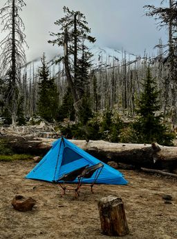 Our camp for the night; a tent in front of Mount Adams, hidden in the clouds