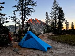 Our blue Black Diamond tent set up for the night, with Mt Stuart in the background.